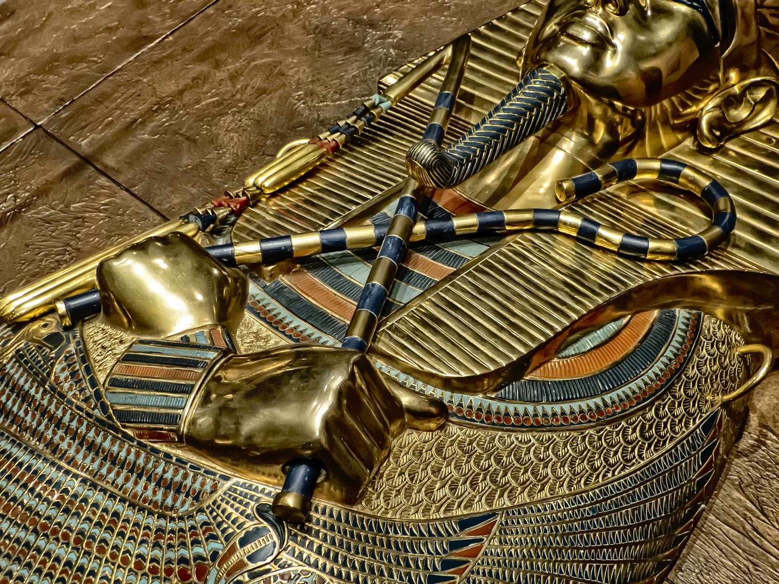 Ancient Egyptian depiction of Tutankhamun holding the royal flail, the nekhakha — a tool originally used to collect labdanum resin